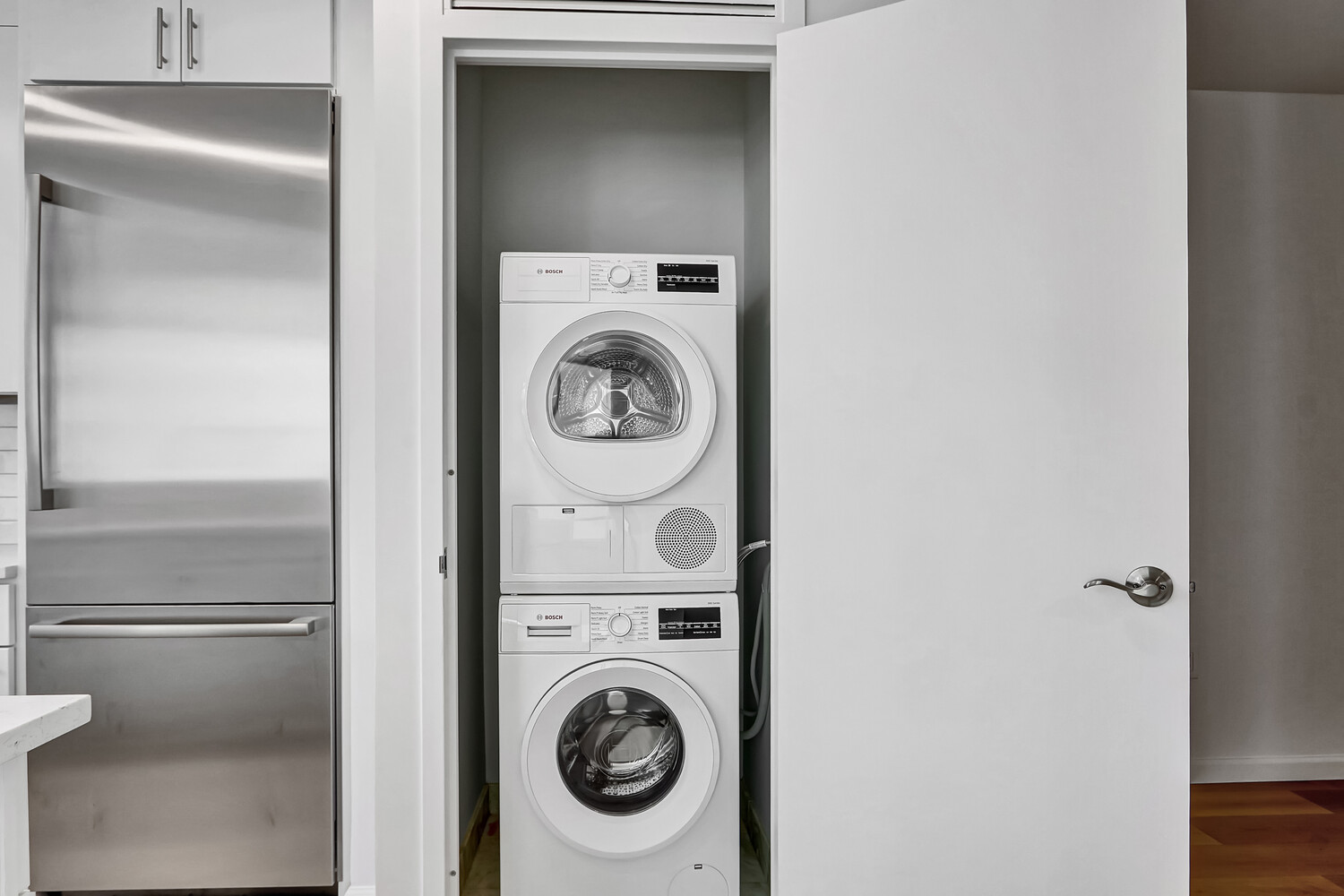 635 West 42nd Street, Unit 7A Manhattan, NY 10036 - Photo 19 of 28 a utility room with dryer and washer