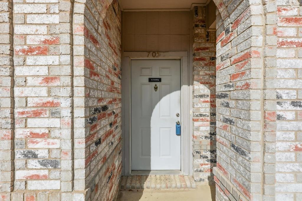 705 Squire Court Allen, TX 75002 - Photo 4 of 27 a view of a brick building
