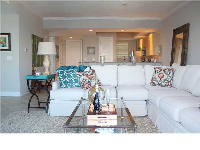 211 Durango Road, Unit 515 Destin, FL 32541 - Photo 1 of 34 a living room with furniture and a wooden floor