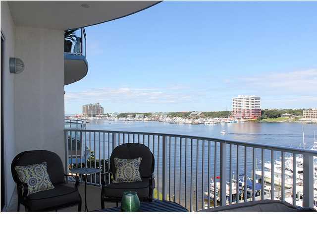 211 Durango Road, Unit 515 Destin, FL 32541 - Photo 5 of 34 a balcony with table and chairs