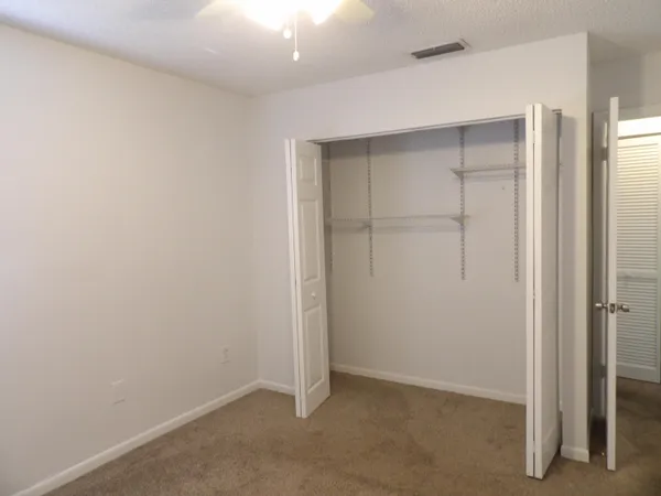 an empty room with closet