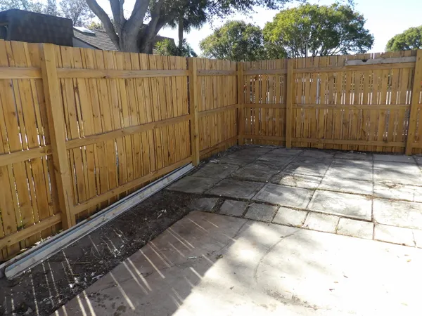 a view of a wooden fence