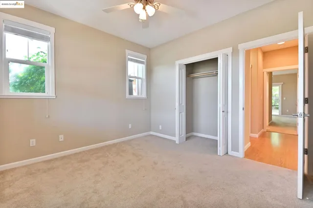 a bathroom with a shower a toilet and a sink