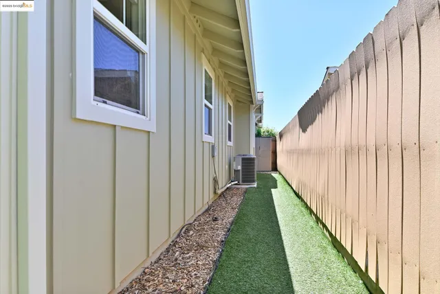 an aerial view of a house with a garden