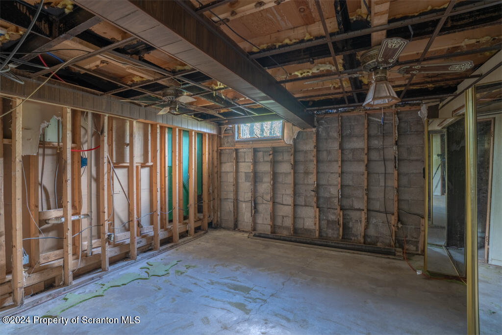 343 Atlantic Street Jessup, PA 18434 - Photo 12 of 19 a view of a room with wooden walls