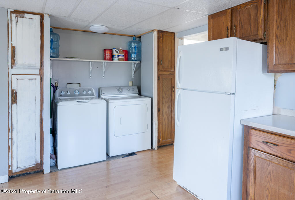343 Atlantic Street Jessup, PA 18434 - Photo 5 of 19 a utility room with dryer and washer