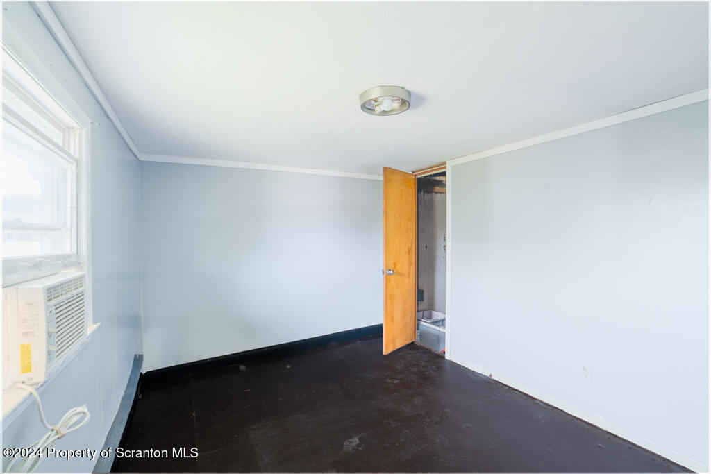 343 Atlantic Street Jessup, PA 18434 - Photo 9 of 19 a view of an empty room with a window