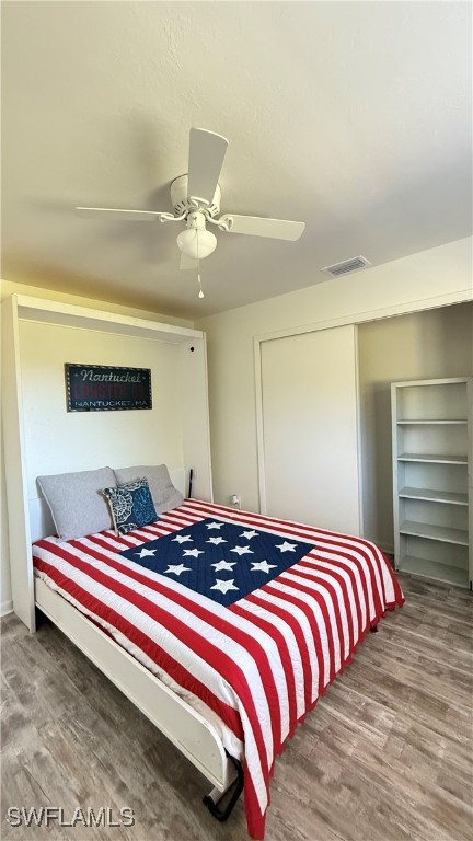 18161 Interlochen Lane Alva, FL 33920 - Photo 13 of 25 a bedroom with a bed and a chandelier