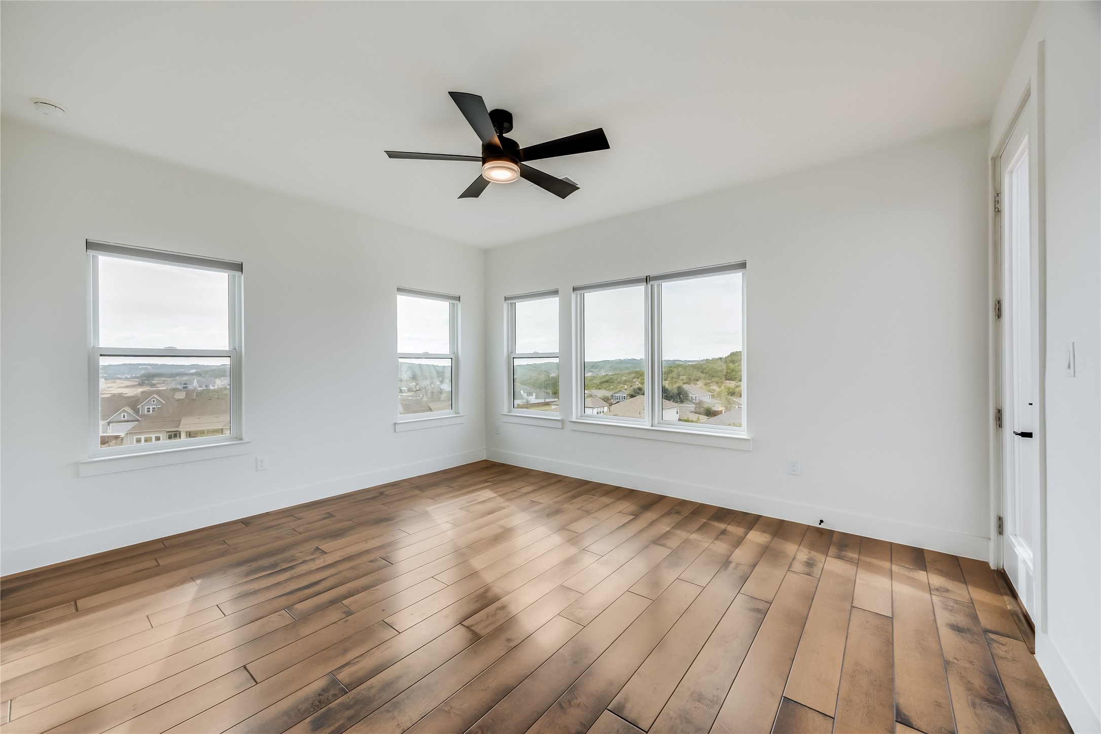 288 Smoke Tree Circle Dripping Springs, TX 78620 - Photo 26 of 40 a view of an empty room and window