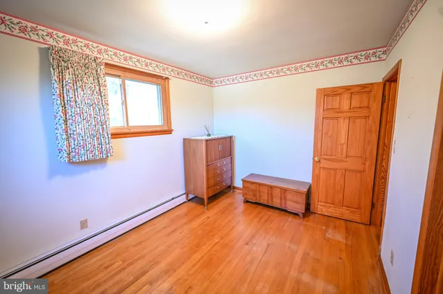 a room with furniture and window