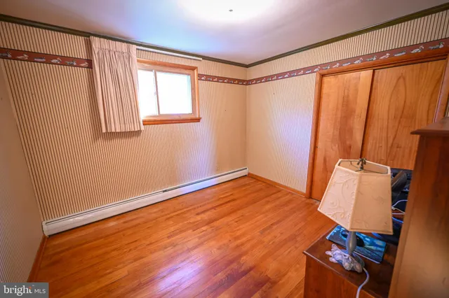 a room with furniture and a window