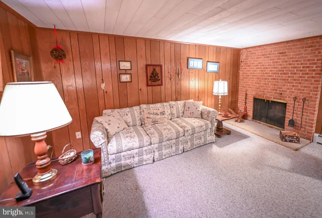 a bathroom with a sink mirror vanity and toilet