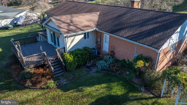 front view of a house with a garden