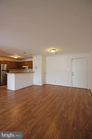 a view of a kitchen with a sink and a stove
