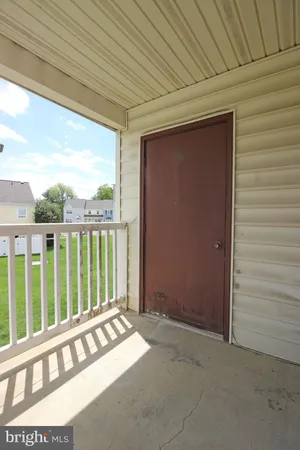 a view of a patio in front of a house
