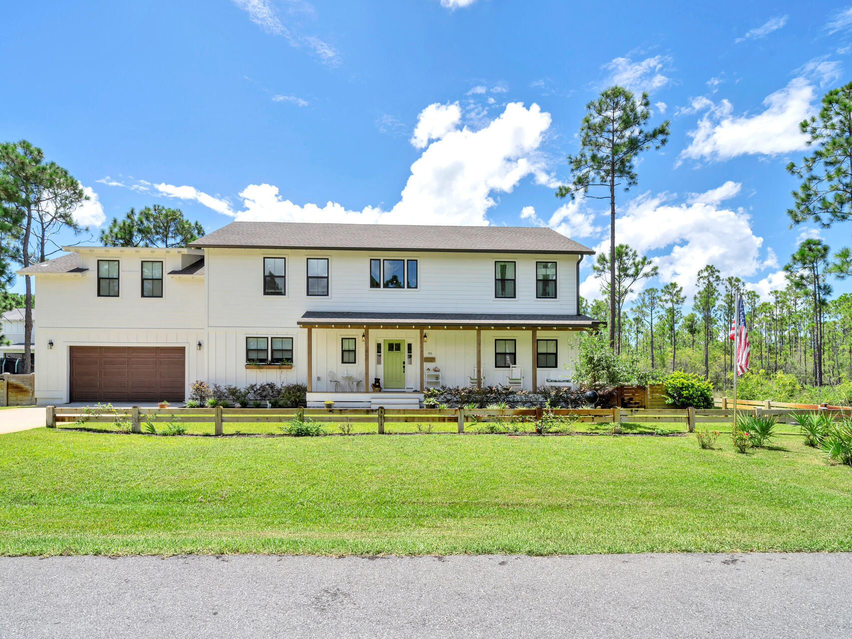 95 Roberts Road Santa Rosa Beach, FL 32459 - Photo 1 of 60 a front view of building with yard and green space