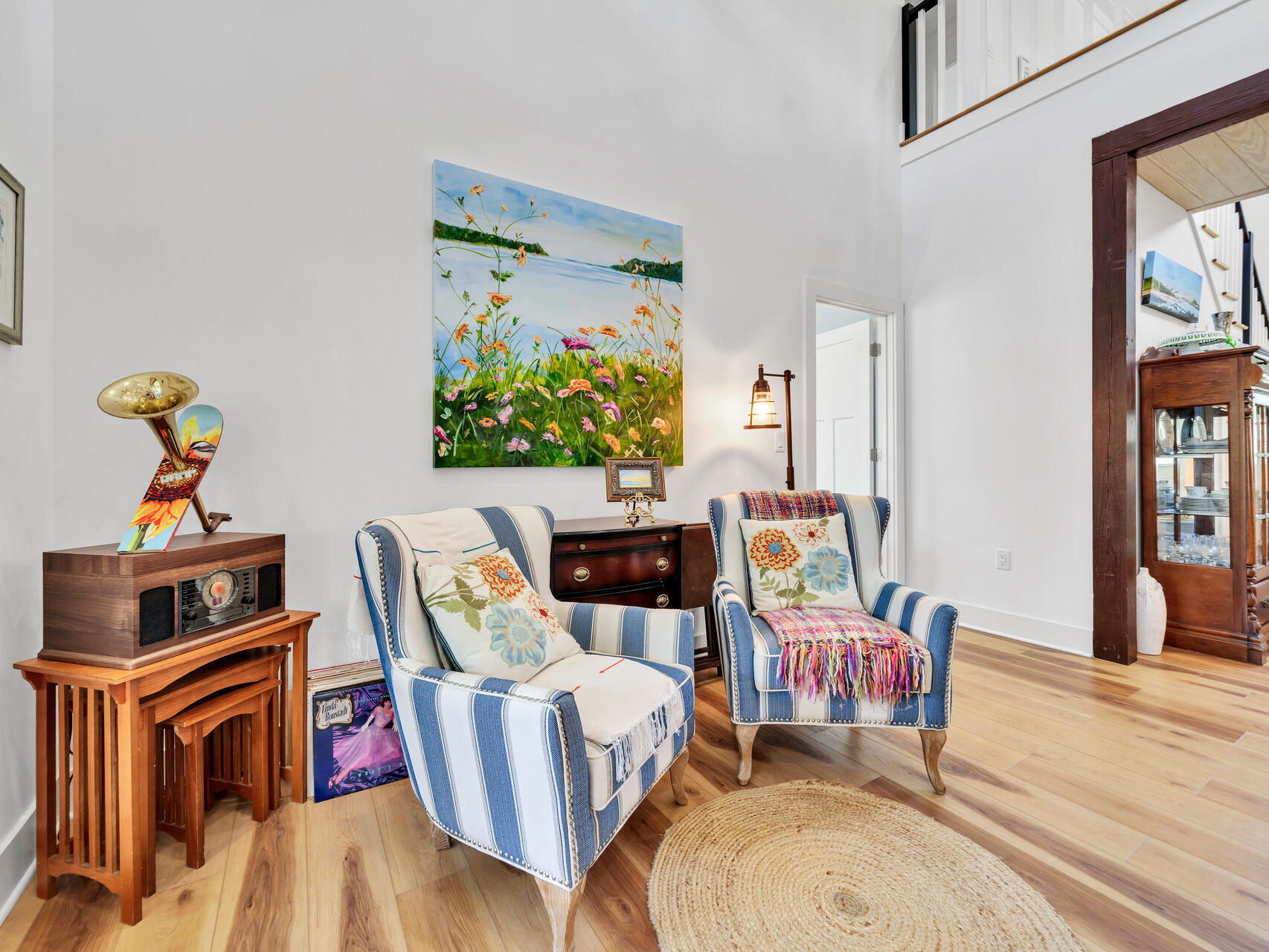 95 Roberts Road Santa Rosa Beach, FL 32459 - Photo 20 of 60 a living room with furniture a rug and wall paintings