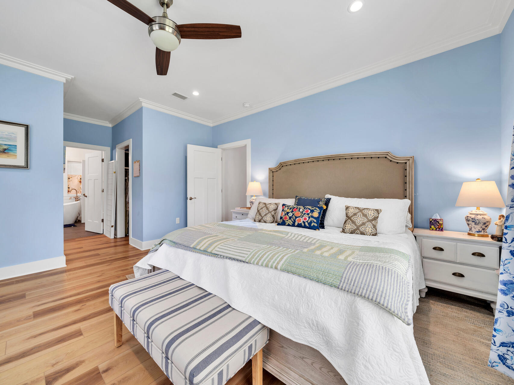 95 Roberts Road Santa Rosa Beach, FL 32459 - Photo 24 of 60 a spacious bedroom with a bed and a wooden floor