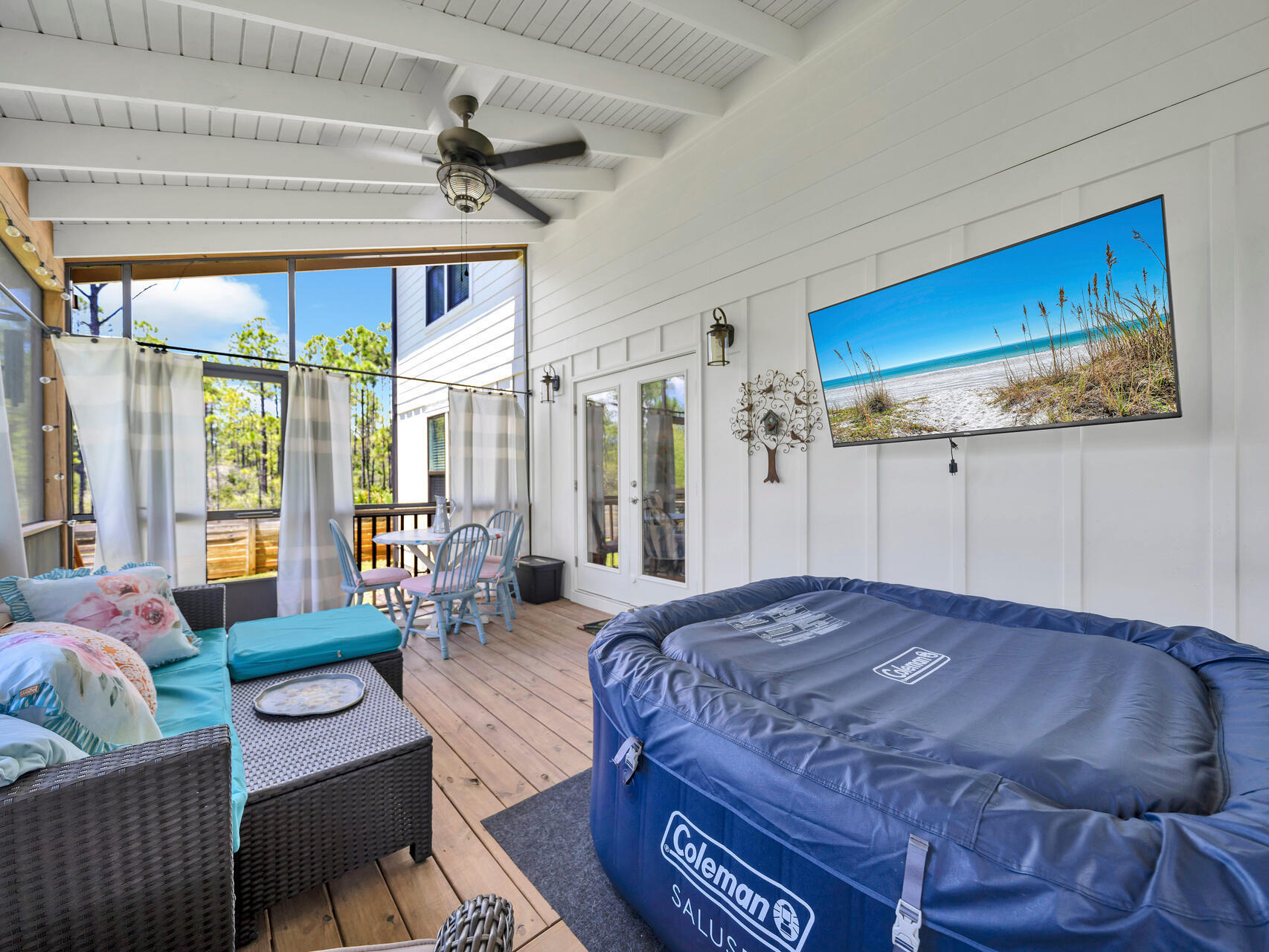 95 Roberts Road Santa Rosa Beach, FL 32459 - Photo 48 of 60 a bedroom with a bed a couch and a window