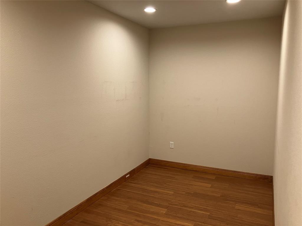 1220 West Trinity Mills Road, Unit 5009 Carrollton, TX 75006 - Photo 12 of 25 a view of an empty room
