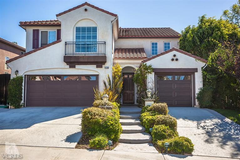 14396 Peach Hill Road Moorpark, CA 93021 - Photo 1 of 45 a front view of a house with garden