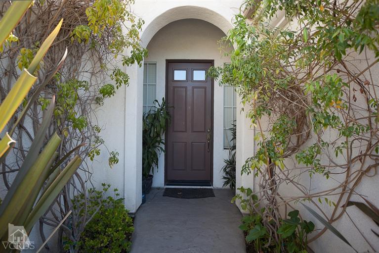 14396 Peach Hill Road Moorpark, CA 93021 - Photo 2 of 45 a view of a wooden door of the house