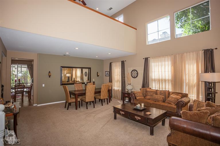 14396 Peach Hill Road Moorpark, CA 93021 - Photo 3 of 45 a living room with furniture and a large window