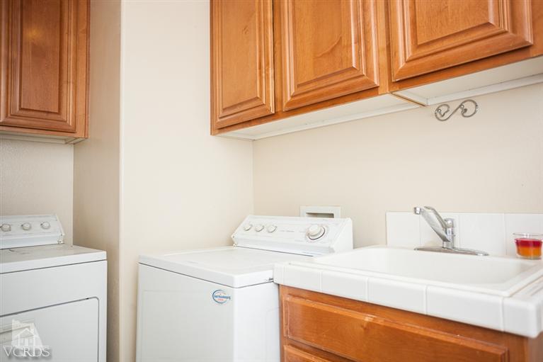 14396 Peach Hill Road Moorpark, CA 93021 - Photo 21 of 45 a utility room with dryer and washer