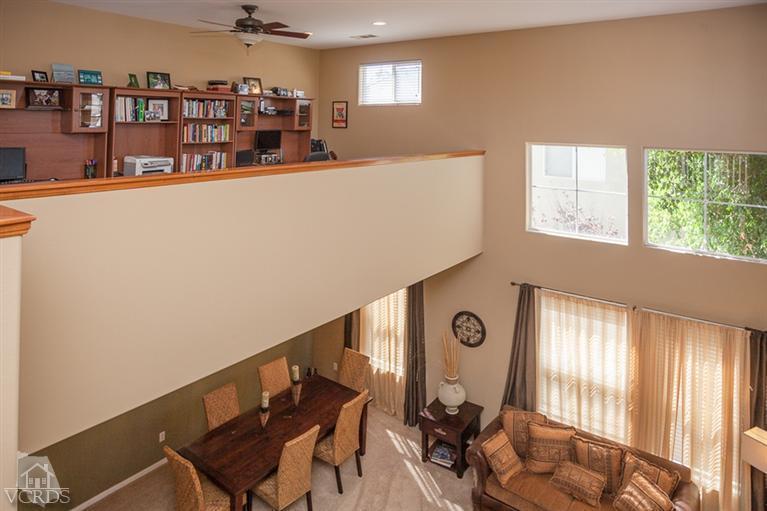 14396 Peach Hill Road Moorpark, CA 93021 - Photo 22 of 45 a view of a livingroom with furniture and windows