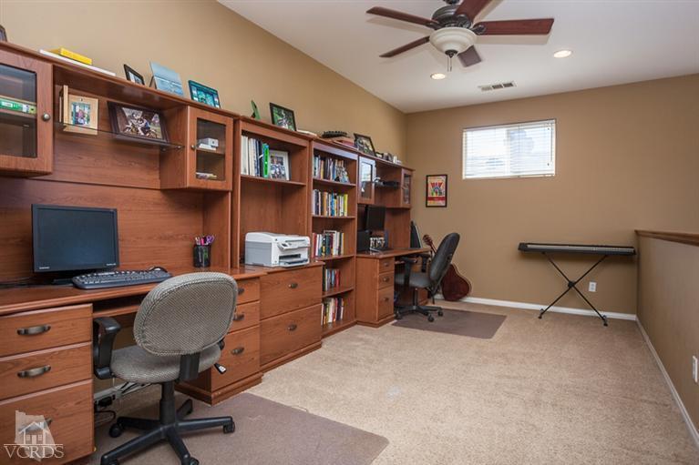 14396 Peach Hill Road Moorpark, CA 93021 - Photo 23 of 45 a view of a workspace with furniture and a window