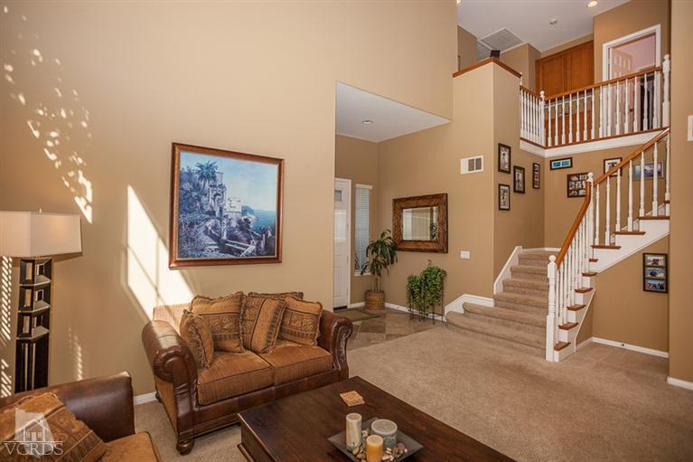 14396 Peach Hill Road Moorpark, CA 93021 - Photo 4 of 45 a living room with furniture and stairs