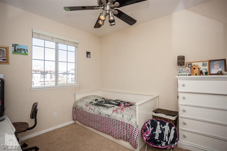 14396 Peach Hill Road Moorpark, CA 93021 - Photo 31 of 45 a bedroom with a bed and a window