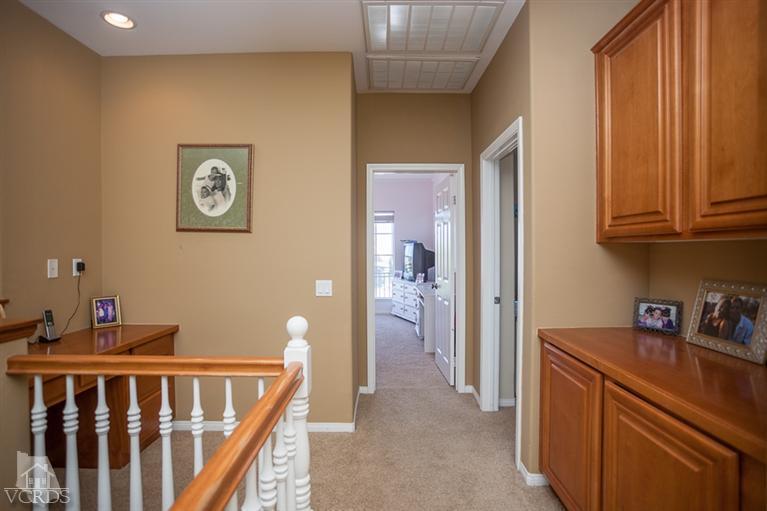 14396 Peach Hill Road Moorpark, CA 93021 - Photo 34 of 45 a bedroom with furniture and baby crib