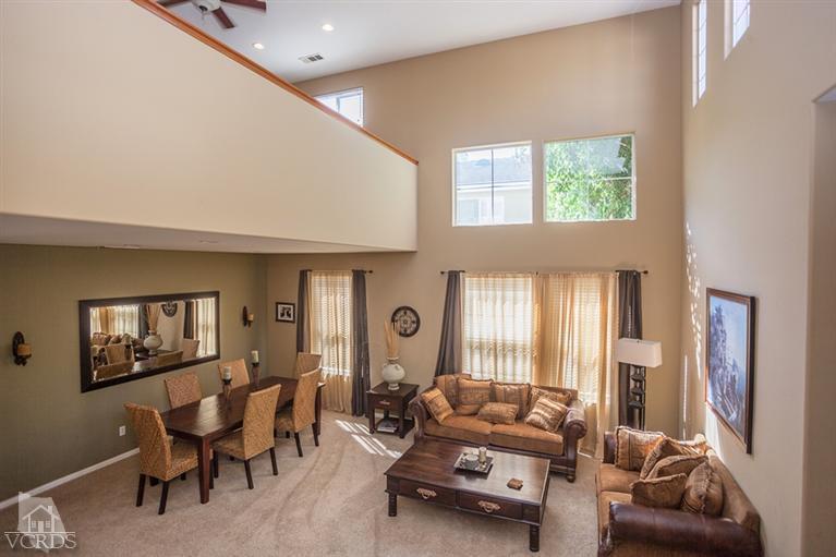 14396 Peach Hill Road Moorpark, CA 93021 - Photo 35 of 45 a living room with furniture and a large window