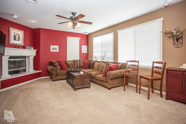 14396 Peach Hill Road Moorpark, CA 93021 - Photo 10 of 45 a living room with furniture and a fireplace