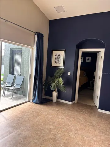 a view of livingroom with furniture and closet