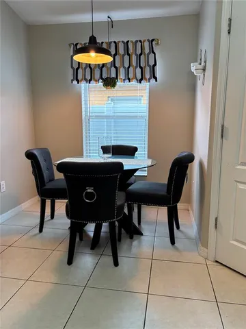 a table and chairs in a room