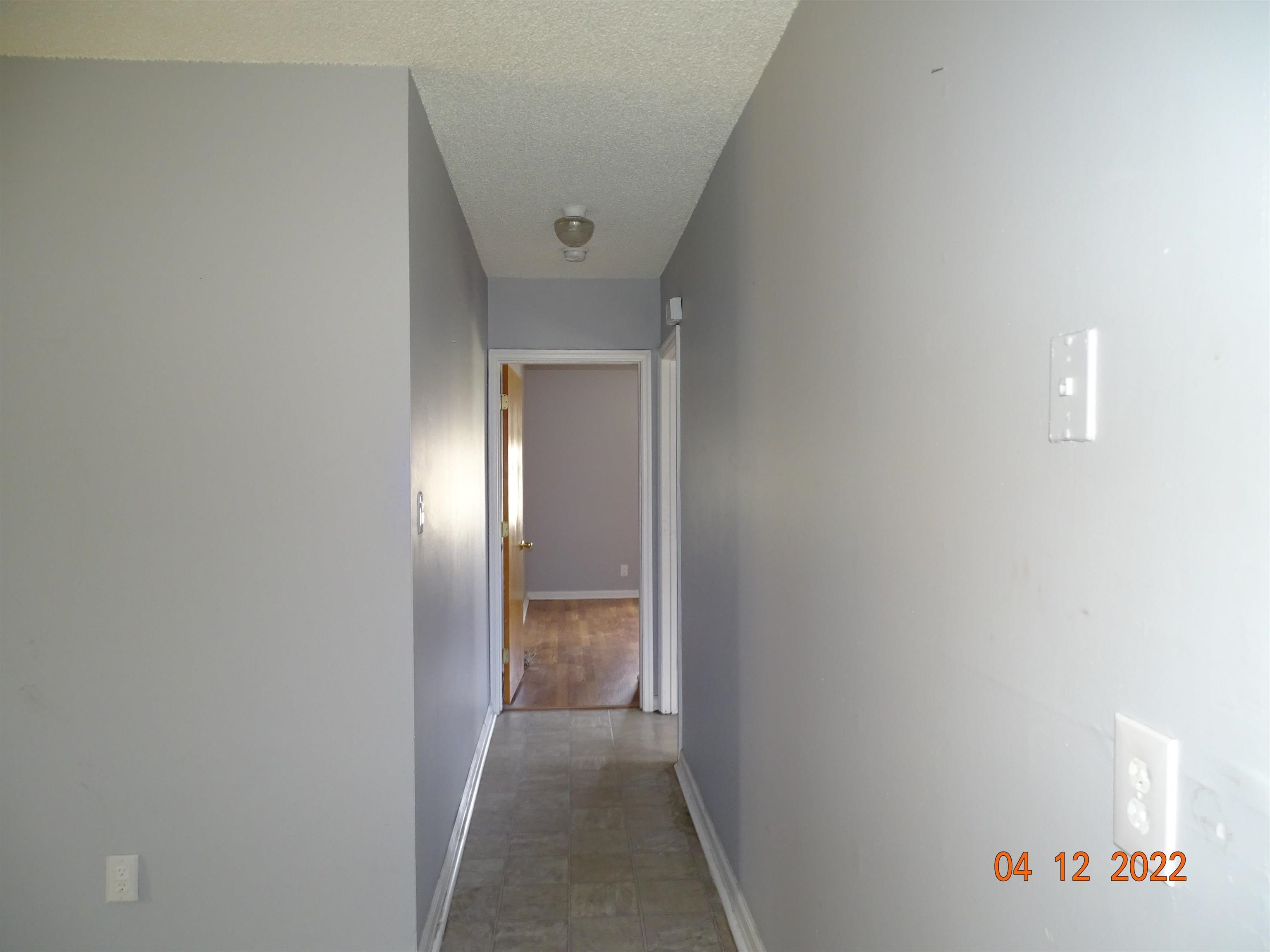 124 West 8th Street, Unit 2 Bayonne, NJ 07002 - Photo 12 of 19 a view of a hallway