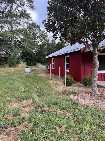 a fire hydrant in the middle of a field