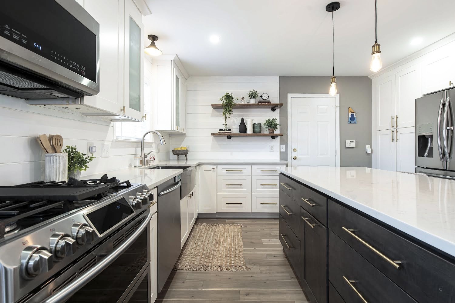 400 Roma Court Nashville, TN 37211 - Photo 11 of 31 a kitchen with stainless steel appliances a sink stove and refrigerator