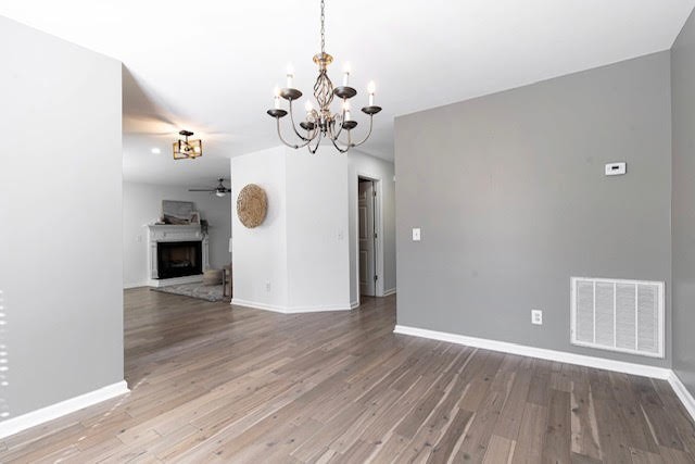 400 Roma Court Nashville, TN 37211 - Photo 14 of 31 a view of an empty room with wooden floor