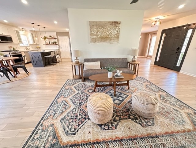 400 Roma Court Nashville, TN 37211 - Photo 16 of 31 a dining room with wooden floor and stainless steel appliances