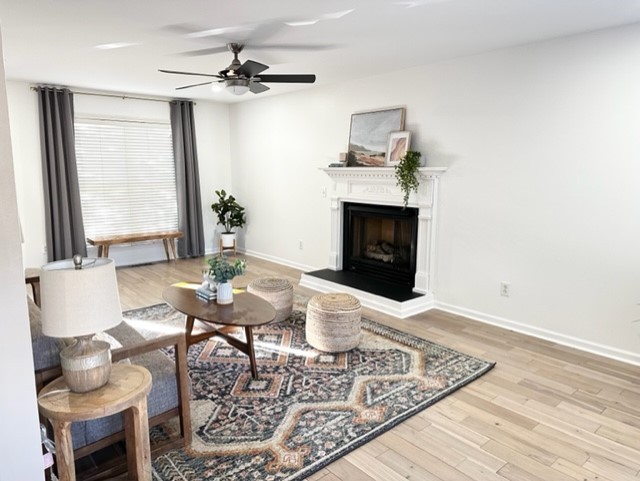 400 Roma Court Nashville, TN 37211 - Photo 18 of 31 a living room with furniture and a fireplace