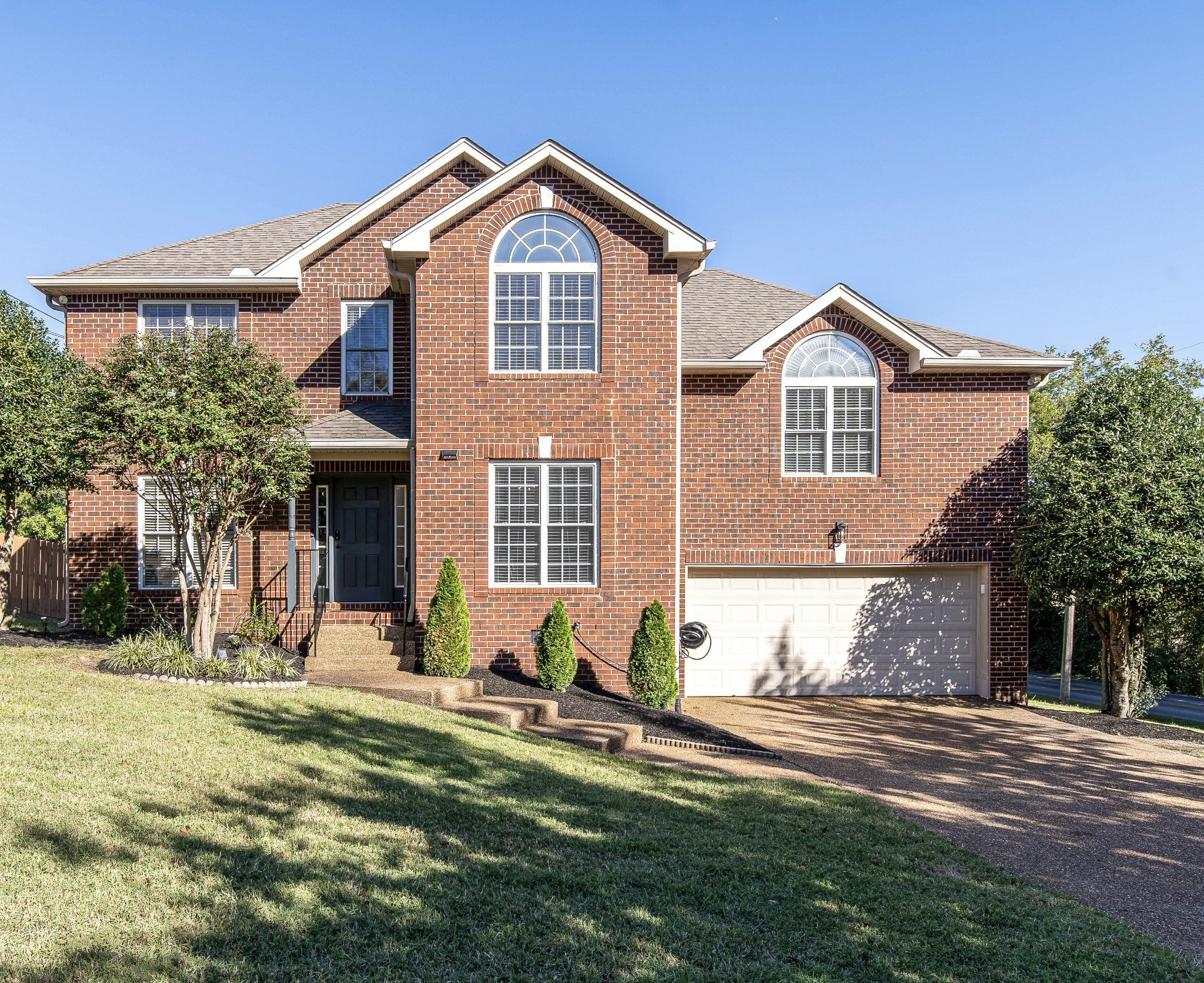 400 Roma Court Nashville, TN 37211 - Photo 2 of 31 a front view of a house with a yard