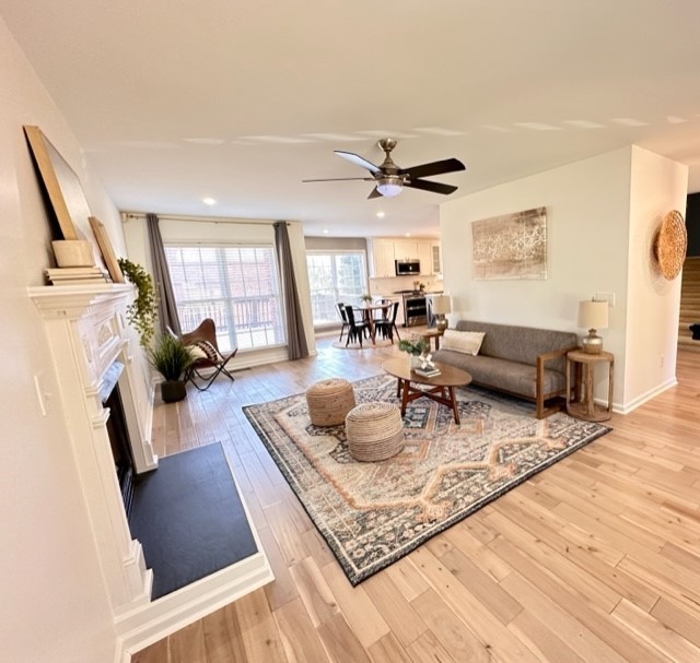 400 Roma Court Nashville, TN 37211 - Photo 21 of 31 a living room with furniture and a wooden floor