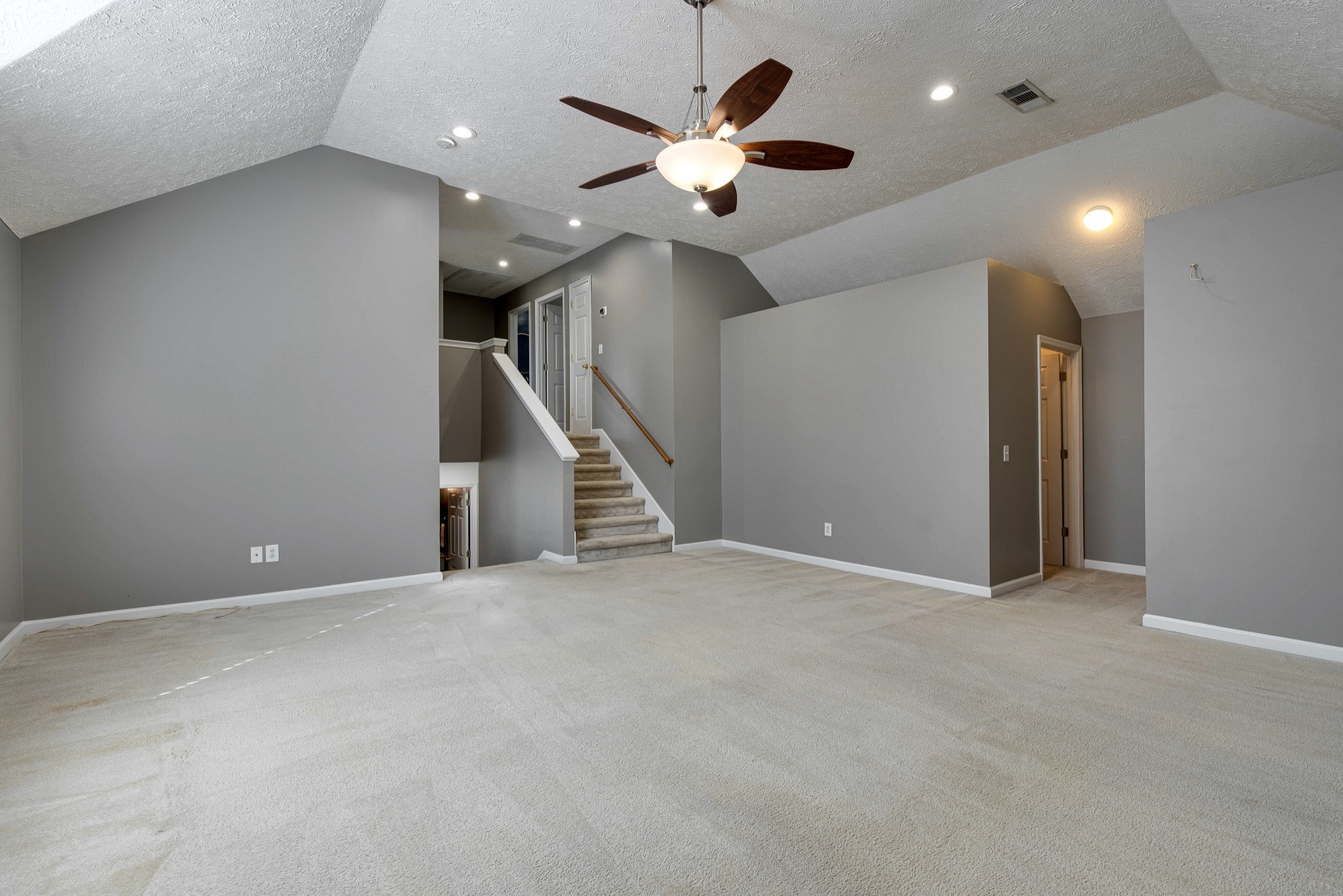 400 Roma Court Nashville, TN 37211 - Photo 23 of 31 an empty room with ceiling fan and entryway