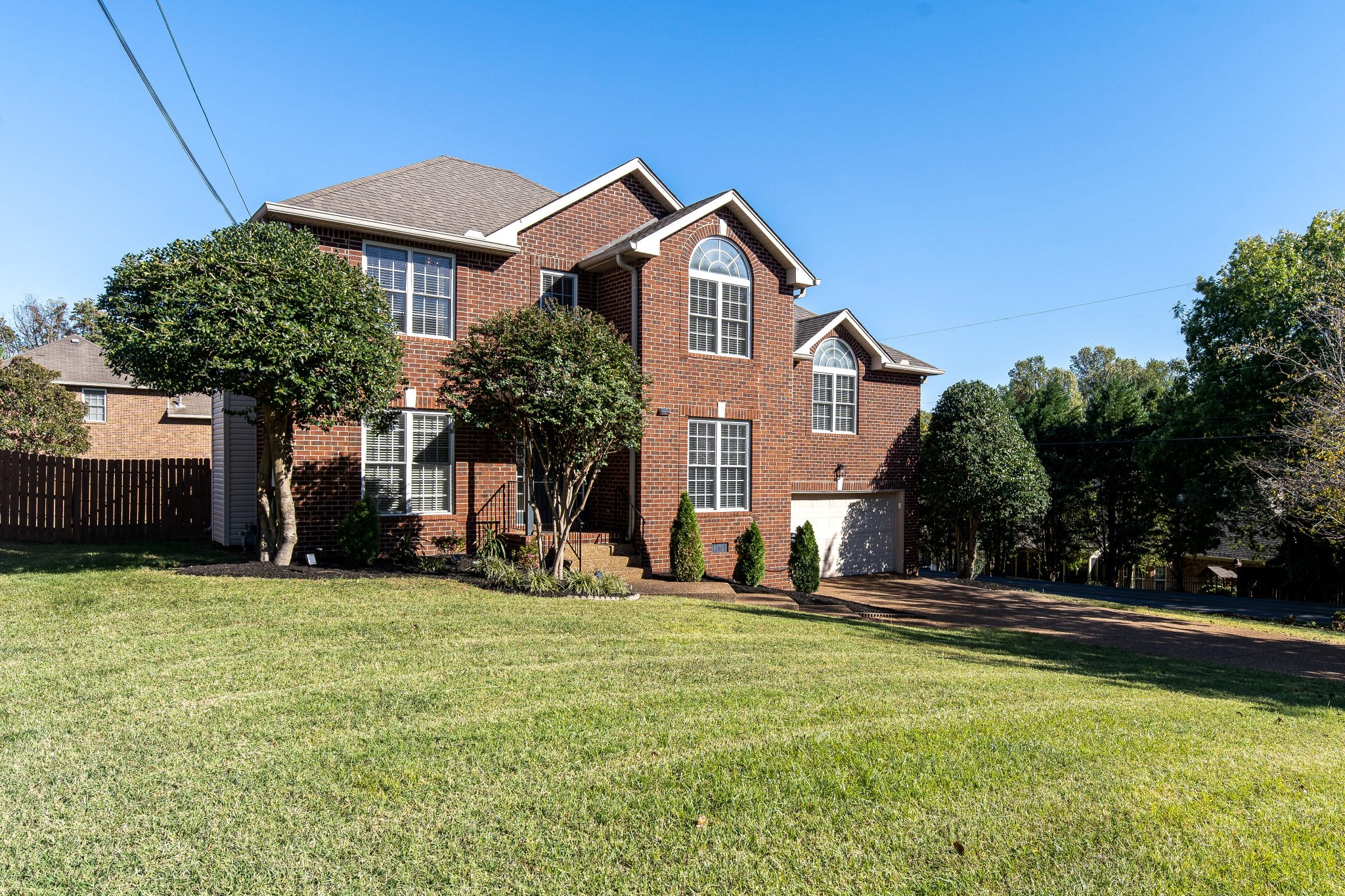 400 Roma Court Nashville, TN 37211 - Photo 3 of 31 a front view of a house with a yard
