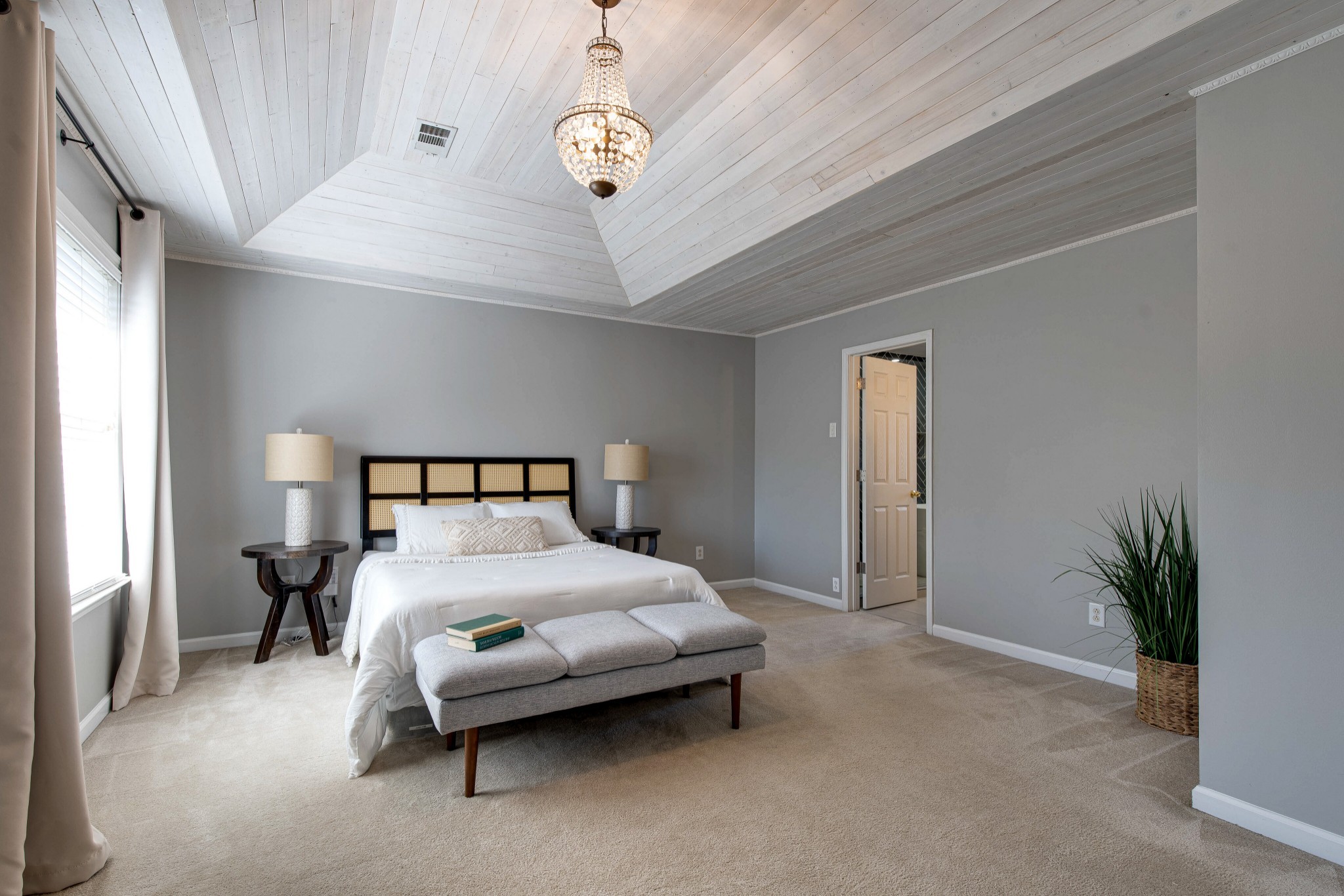 400 Roma Court Nashville, TN 37211 - Photo 5 of 31 a bedroom with a bed and a chandelier