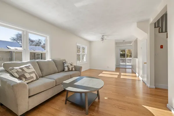 a living room with furniture and a table