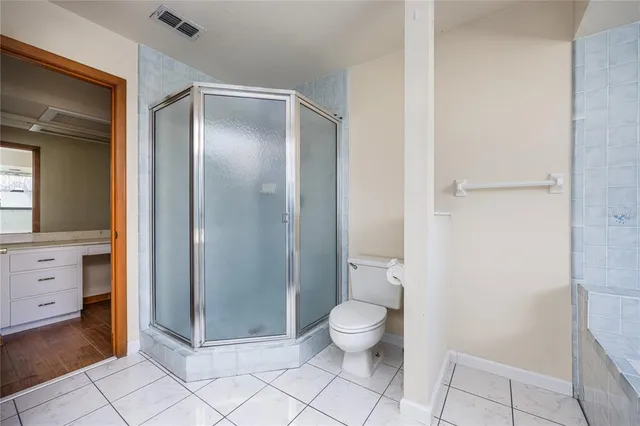 a white bath tub sitting in a bathroom